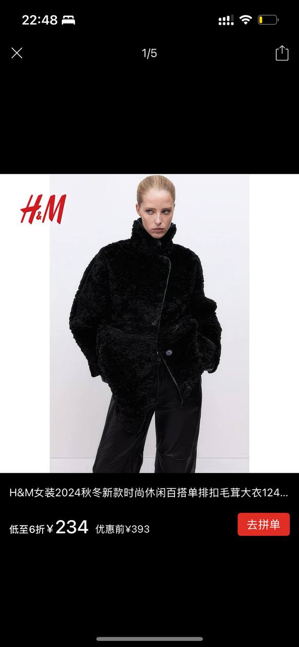 женская куртка из искусственного меха черного цвета